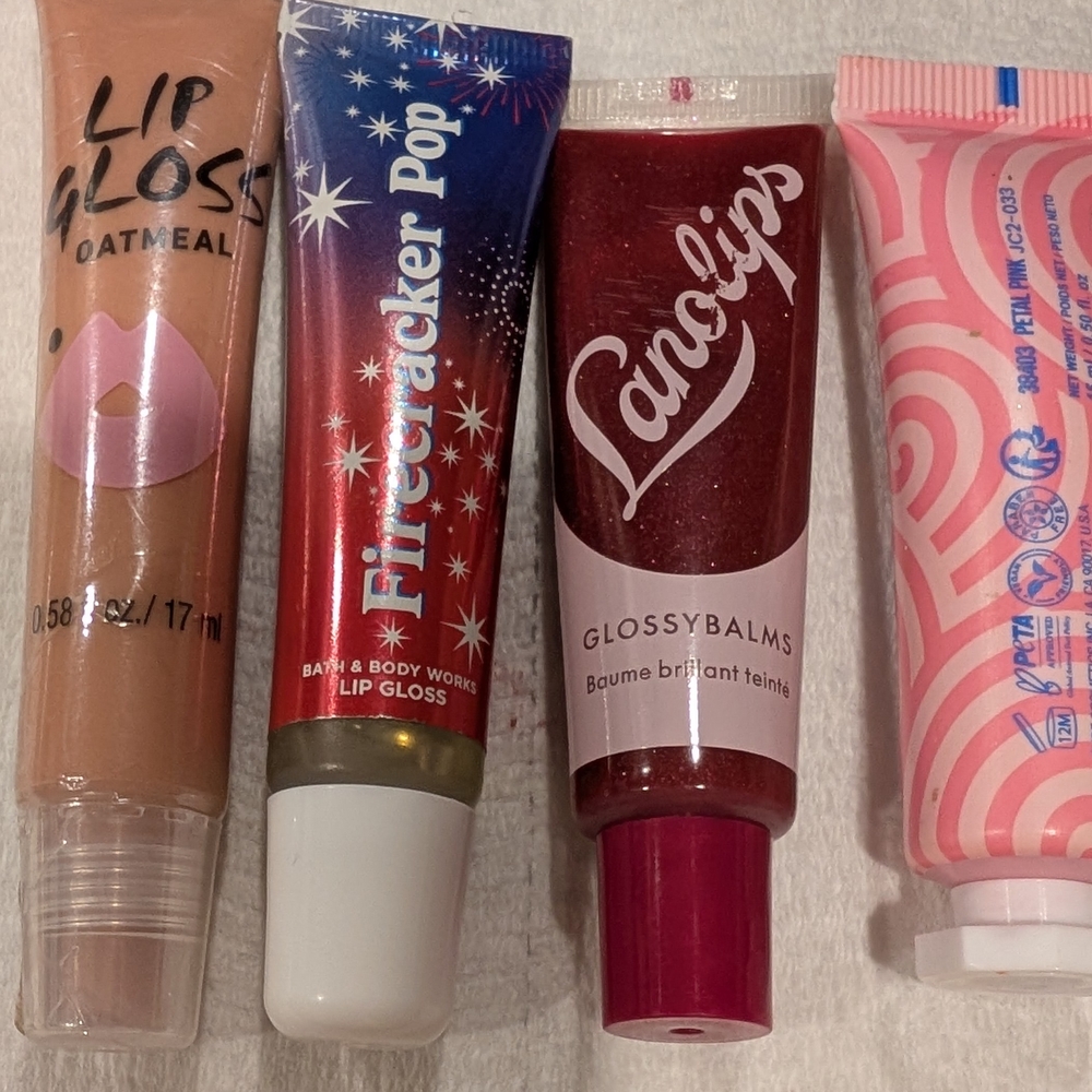 Four Lip Glosses - Selling as a Lot